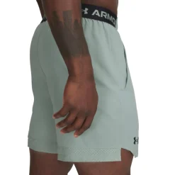 UA Vanish Woven 6″ Shorts Silica Green